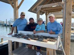 Four people fishing in Avalon