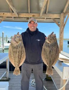 Two Southern Flounder fish caught in Avalon