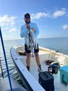 Angler fishing for spotted weakfish in MS