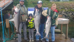 Five people fishing with 3 big fish in Warrenton