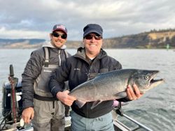 Photograph of a pink salmon being caught while fishing in WA