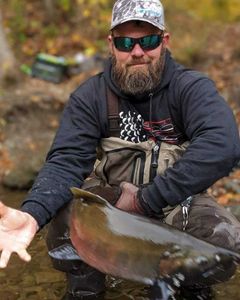 Angler with a 17-inch fish in Altmar