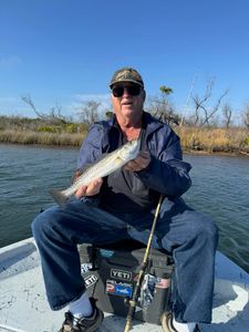 Angler with a 13-inch fish in Panama City