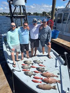 4 people fishing in Panama City