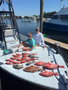 4 red grouper fish caught while fishing in FL