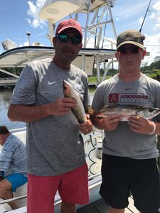 Two people enjoying a great fishing trip in Freeport