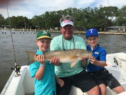 A redfish caught by 3 people in Freeport while fishing