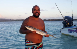 Single angler fishing in Buccoo