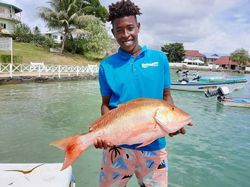 One person fishing in Buccoo
