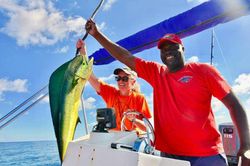 One fisherman reeling in a 30-inch catch in Buccoco