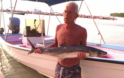 Photograph of a king mackerel fish caught during a fishing trip in Buccoo