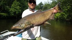 Angler with a big fish in Custer