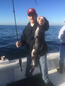 A lone angler reeling in a big catch in Cape May