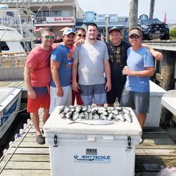 Six happy anglers fishing at Cape May