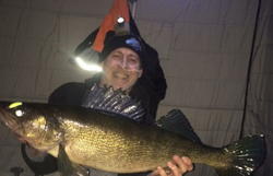 Fisherman holding a 31-inch catch in Minnesota