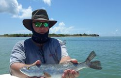Angler fishing in Corpus Christi with a 21-inch catch