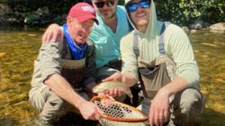 Rainbow trout being released during fishing trip in Florida City FL