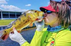 A person fishing with a rod in Florida