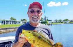 Person fishing with rod in FL
