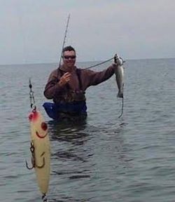 A person fishing in TX