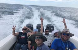 A group of 6 people in Port O'Connor, engaged in fishing, hunting, and tours.