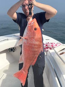 Large red snapper caught fishing in Port O'Connor TX waters displayed on boat deck