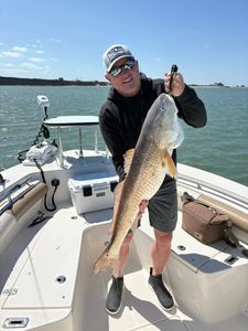 Large redfish caught during fishing charter in Port O'Connor Texas