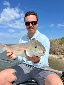 Two people fishing with fishing gear in Seadrift