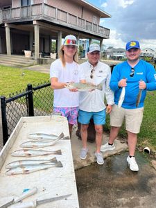 4 people fishing in TX