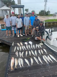 7 redfish caught on a fishing trip at Tiki Island