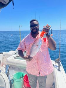 Fisherman with 1 fish catch at Wrightsville Beach