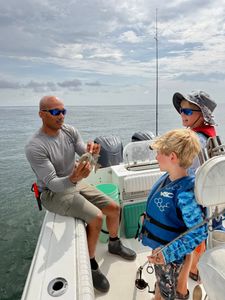 Three people fishing in North Carolina