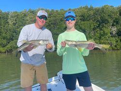Two people fishing in FL with big fish