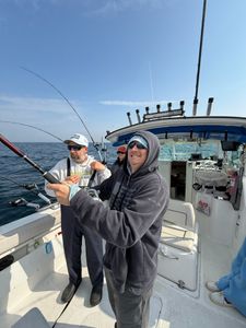 Three people fishing in WI