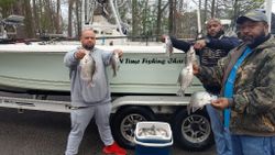 Two anglers fishing with nets in the Thomson area