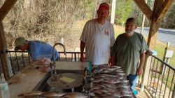Two anglers enjoying a fishing trip in Thomson