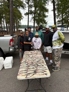 Group of 7 people fishing in Thomson