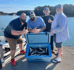 Three people enjoying a fishing trip in GA