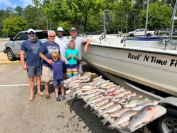 Six people enjoying a fishing trip in GA