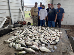 Six anglers fishing with rods at Mcalester