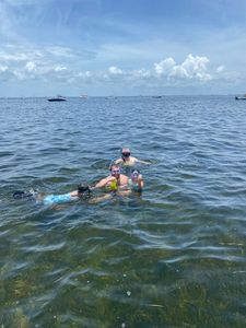 Two people enjoying a great fishing trip in FL