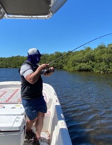 Scenic holiday landscape with fishing rod