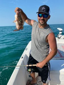 A person fishing on holiday