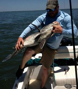 A person enjoys a holiday fishing experience.