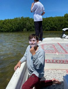 A person fishing on a holiday trip