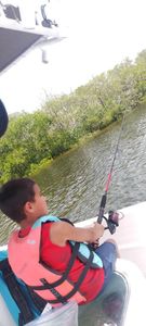 Person enjoying a holiday fishing trip