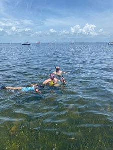 Three people on holiday fishing