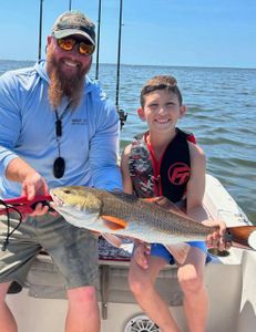 Successful redfish catch during holiday fishing trip