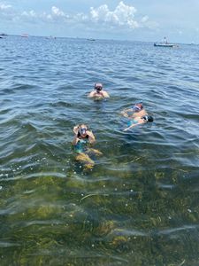 Person enjoying a holiday fishing trip