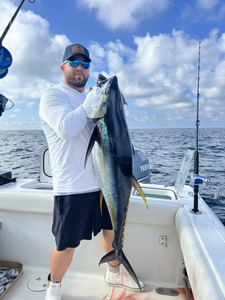 One fisherman catching a big fish in Barnegat Light